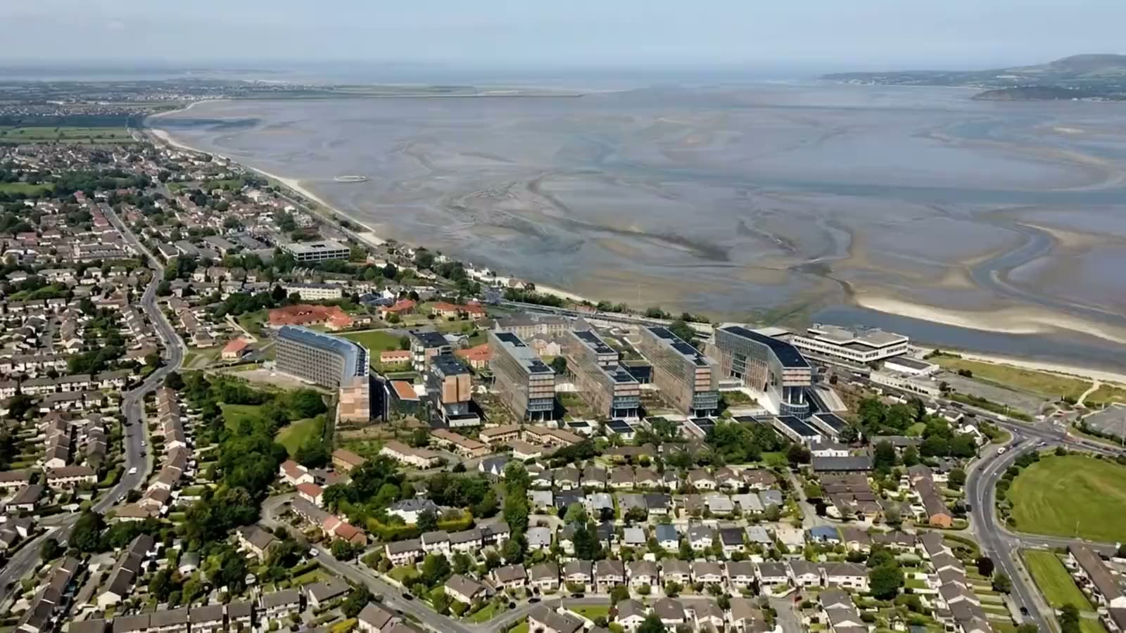 The Elmpark Green campus and Dublin Bay from the air
